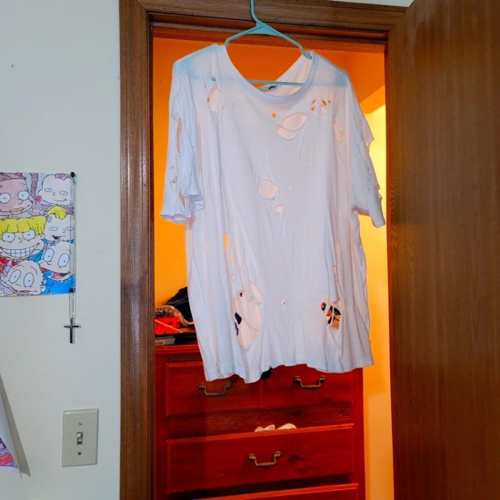Womens white distressed top.